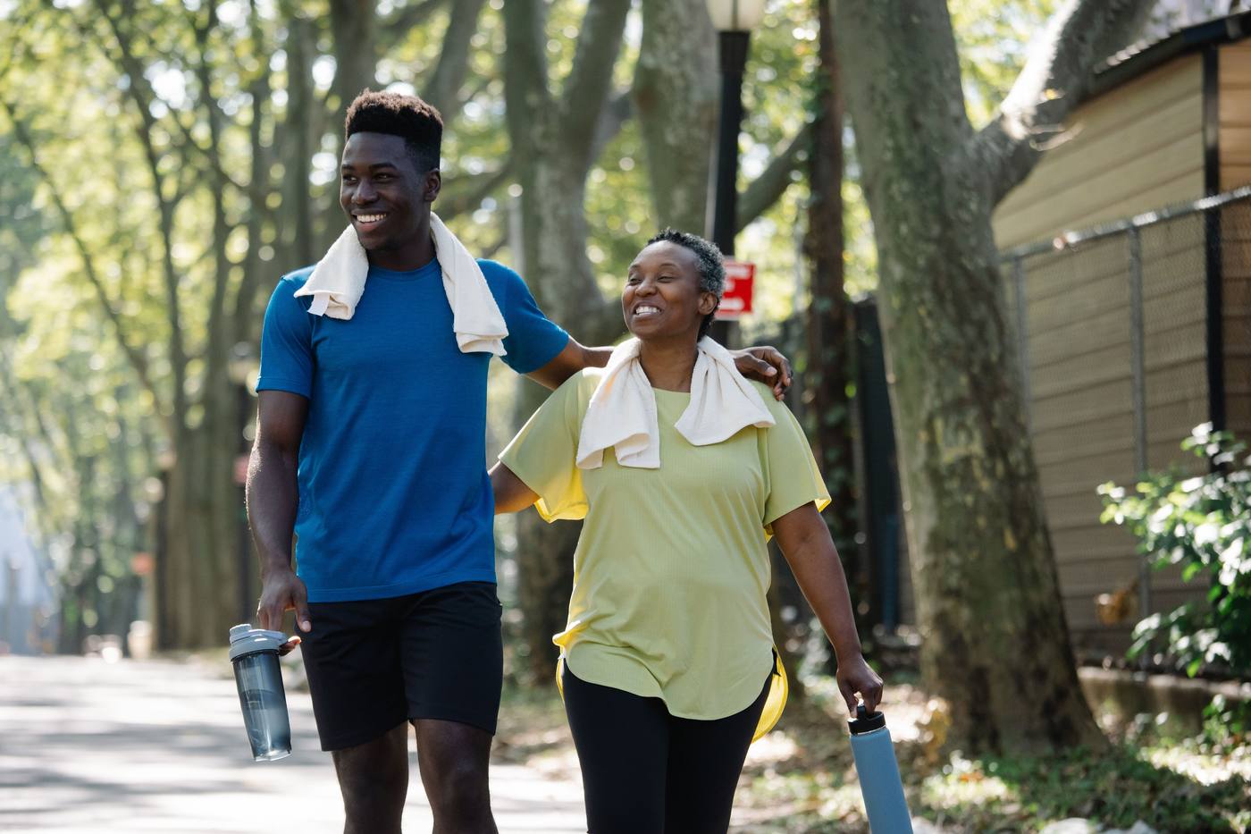 Two people walking together after exercise